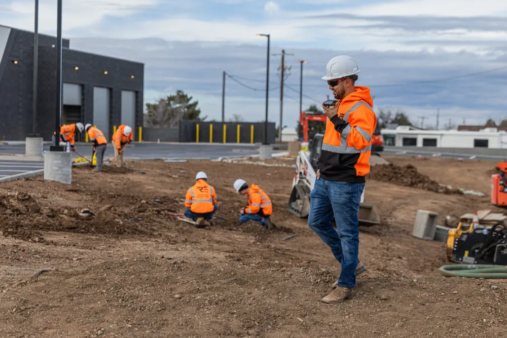 An RE and Sons lead on a commercial site in hi-vis